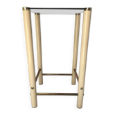 Square side table in metal and smoked glass.