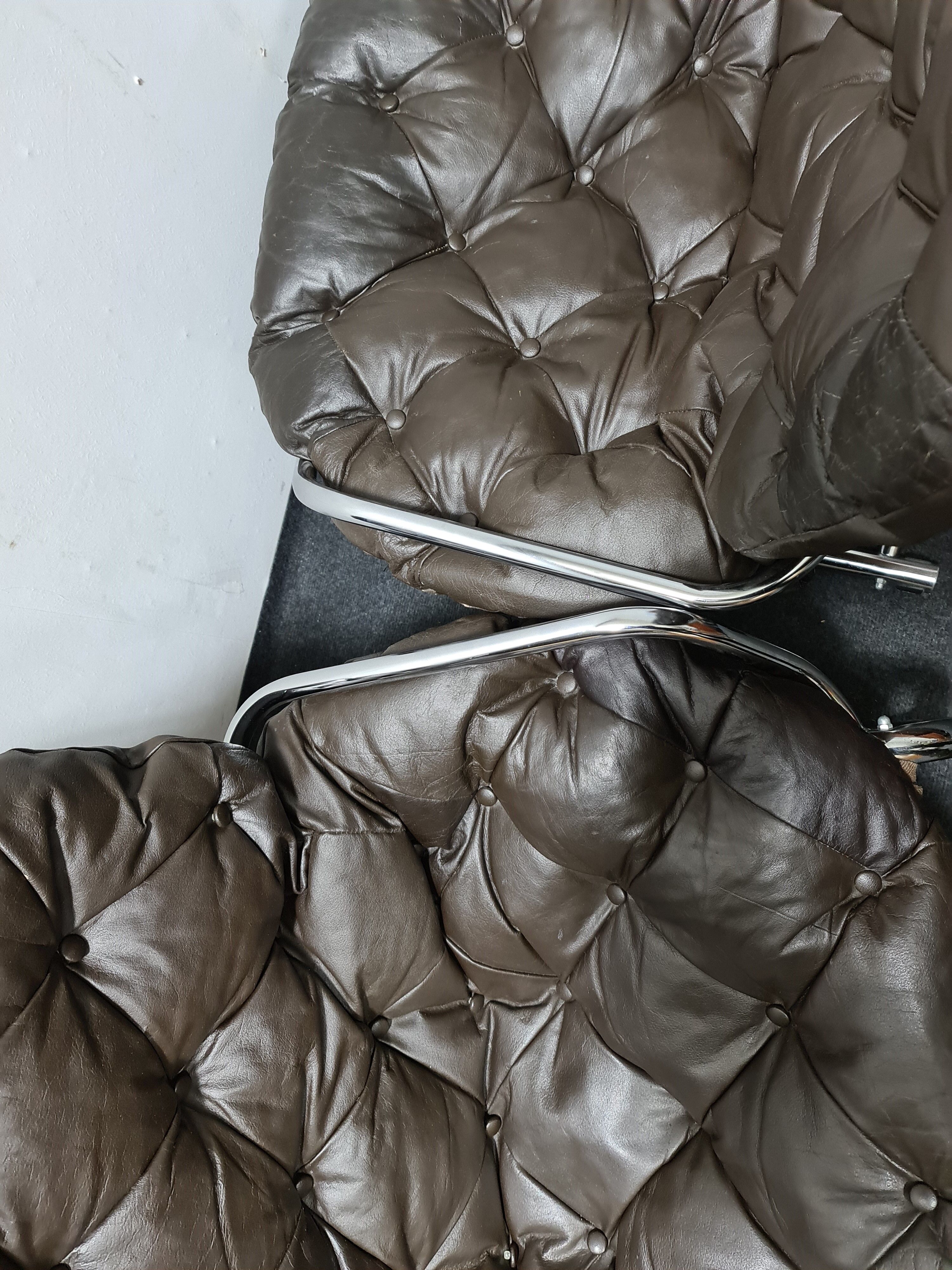 Pair of chrome and leather vintage chairs