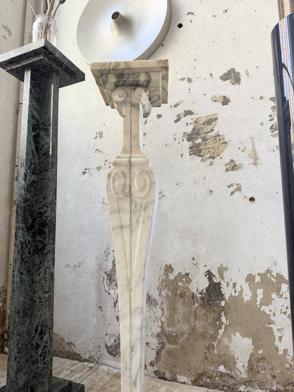 Set of 4 marble columns or pedestals.