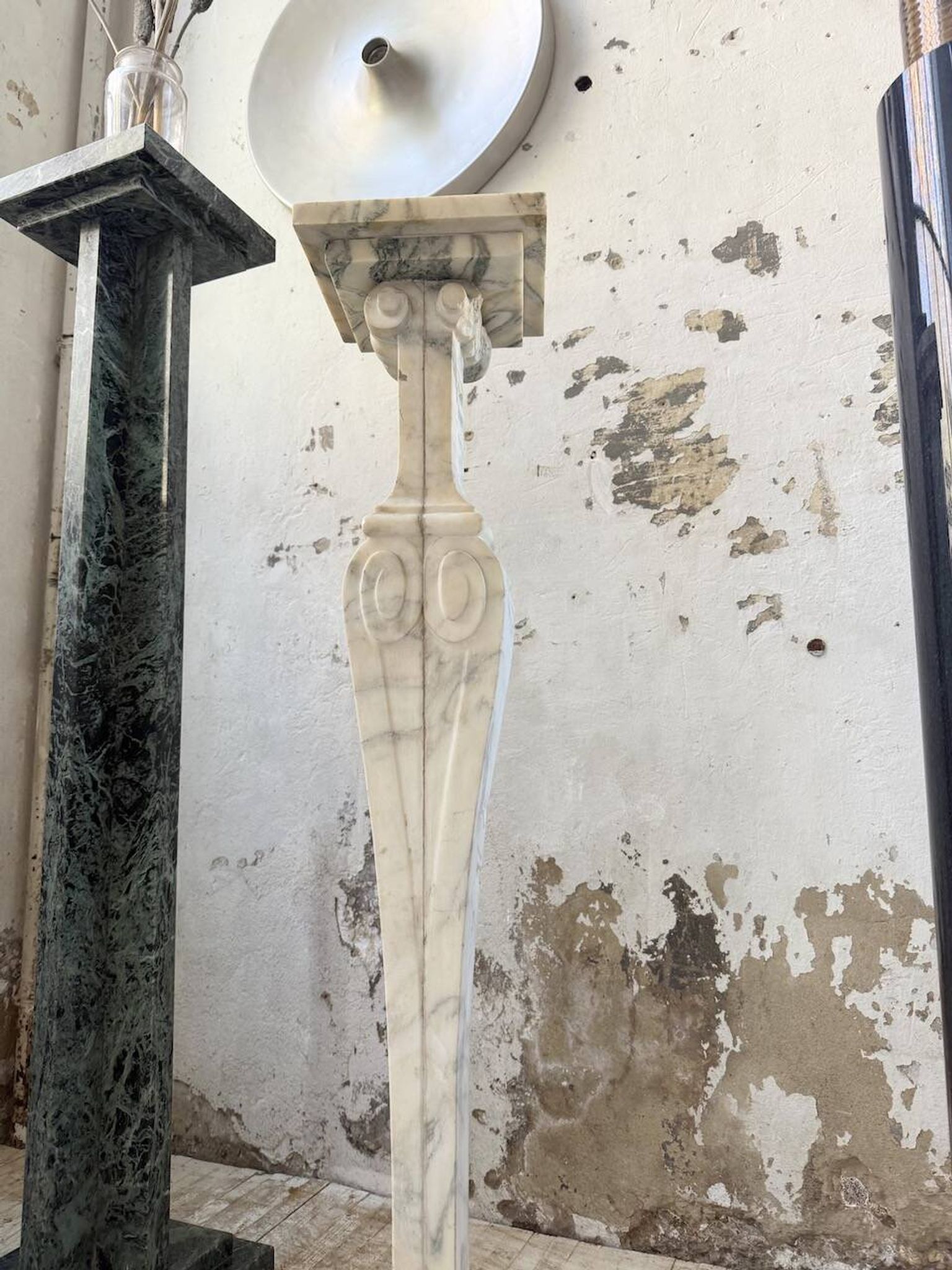 Set of 4 marble columns or pedestals.