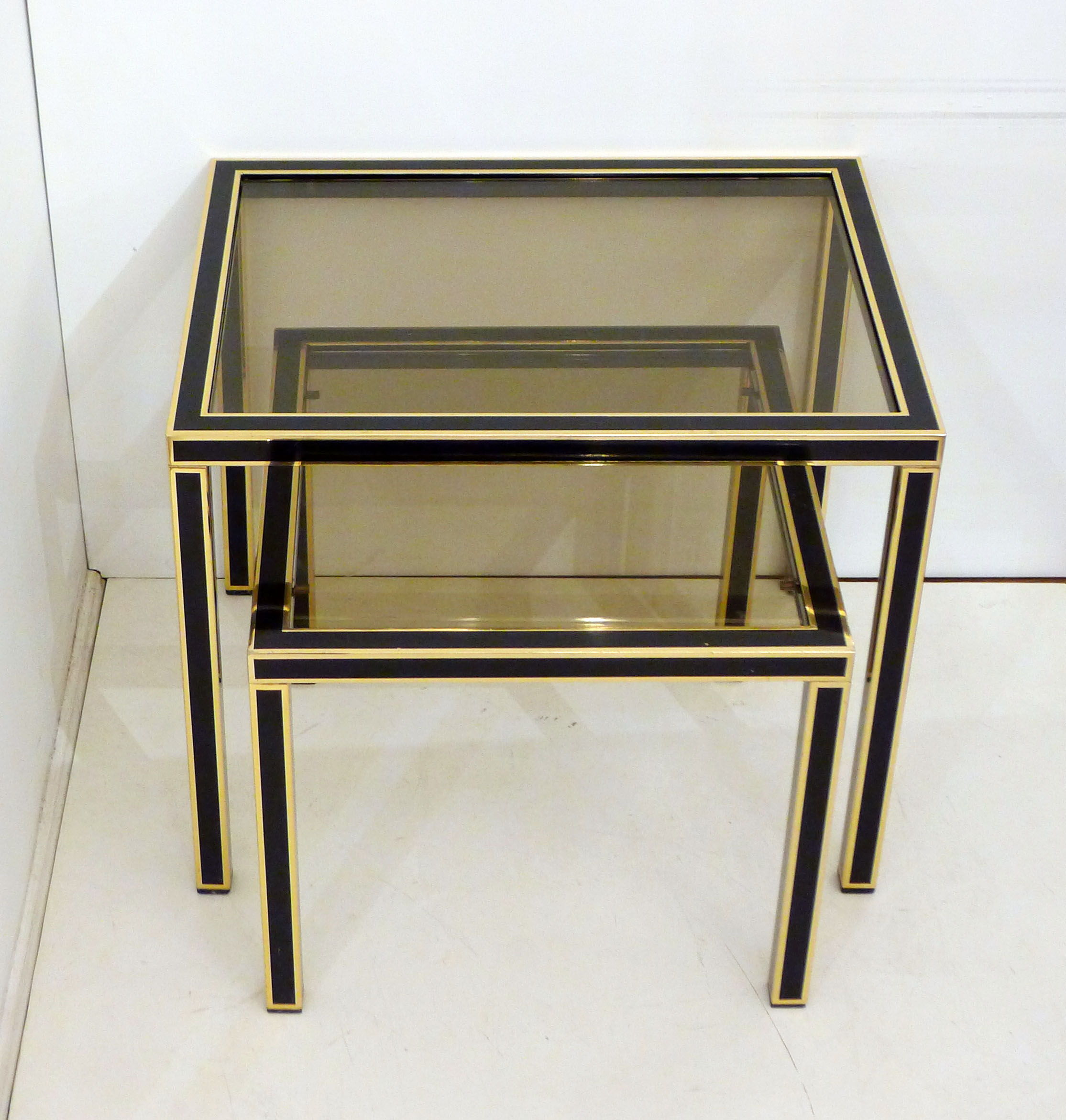 Pair of black & gold trundle tables 1970'