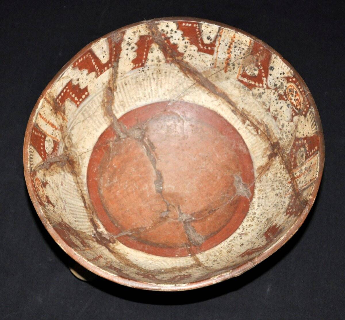 Polychrome ceramic tripod cup from the Mesoamerican tradition