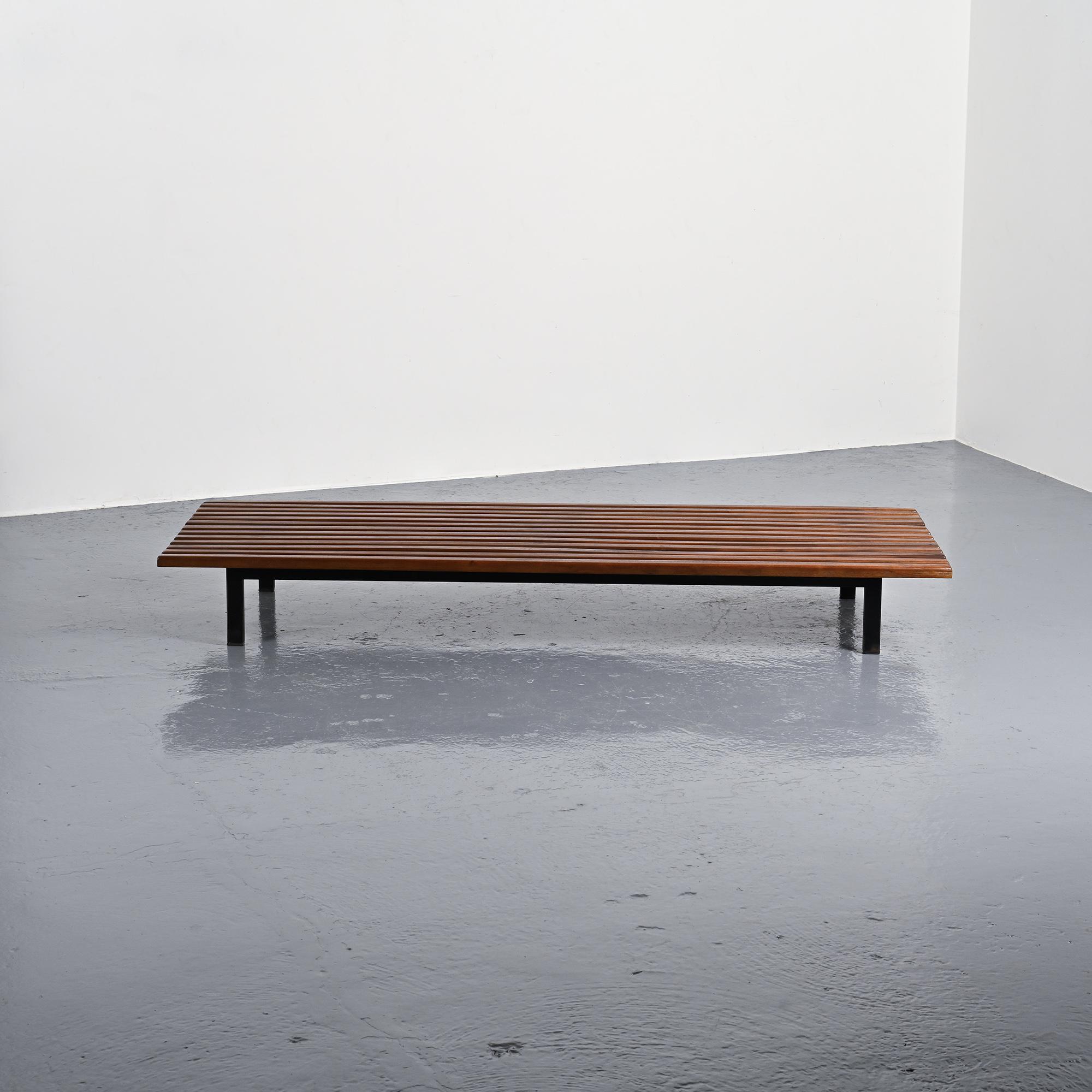 Cansado bench in mahogany by Charlotte Perriand, circa 1962.
