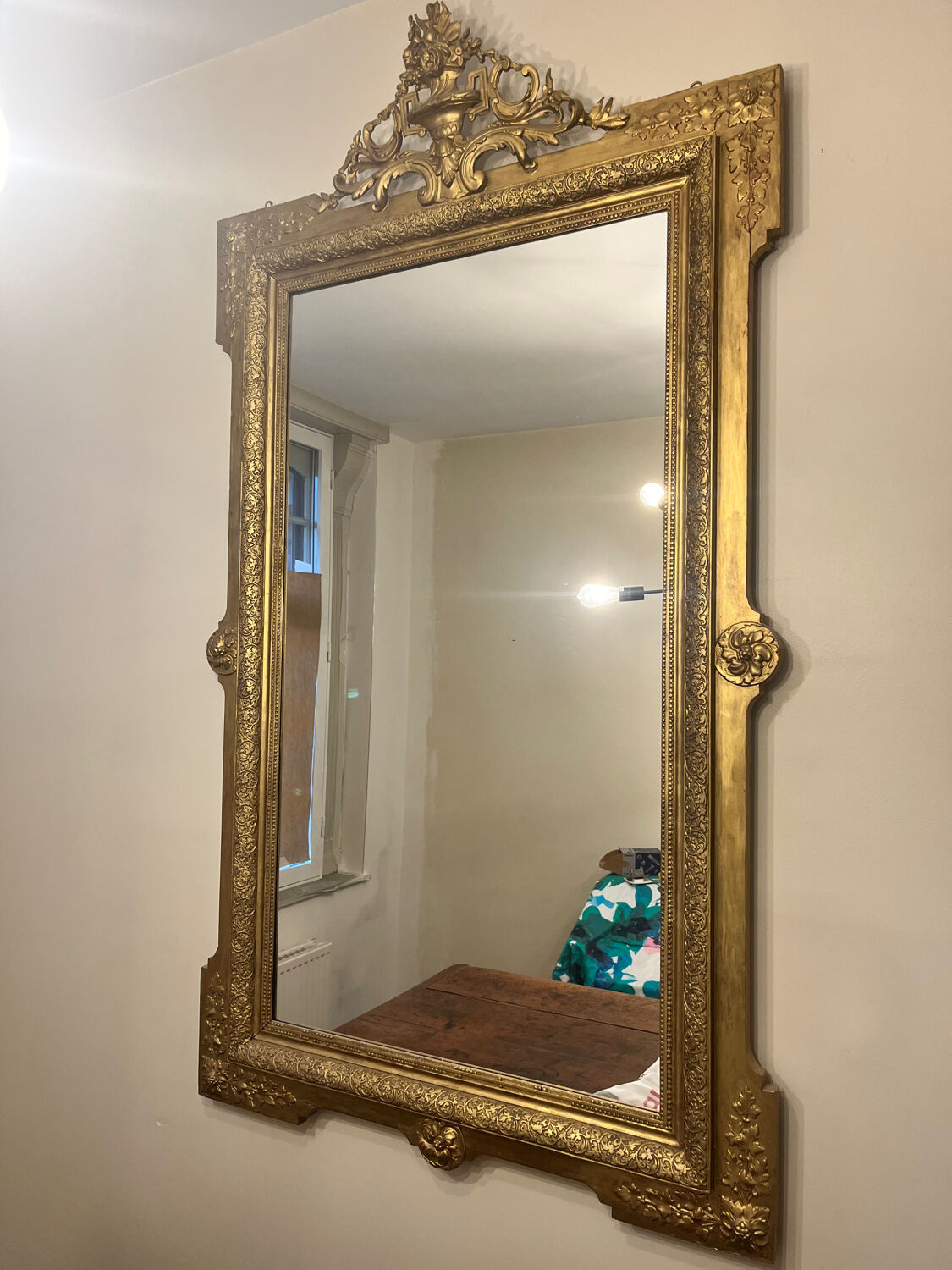 Antique gilded mirror in Louis XVI style