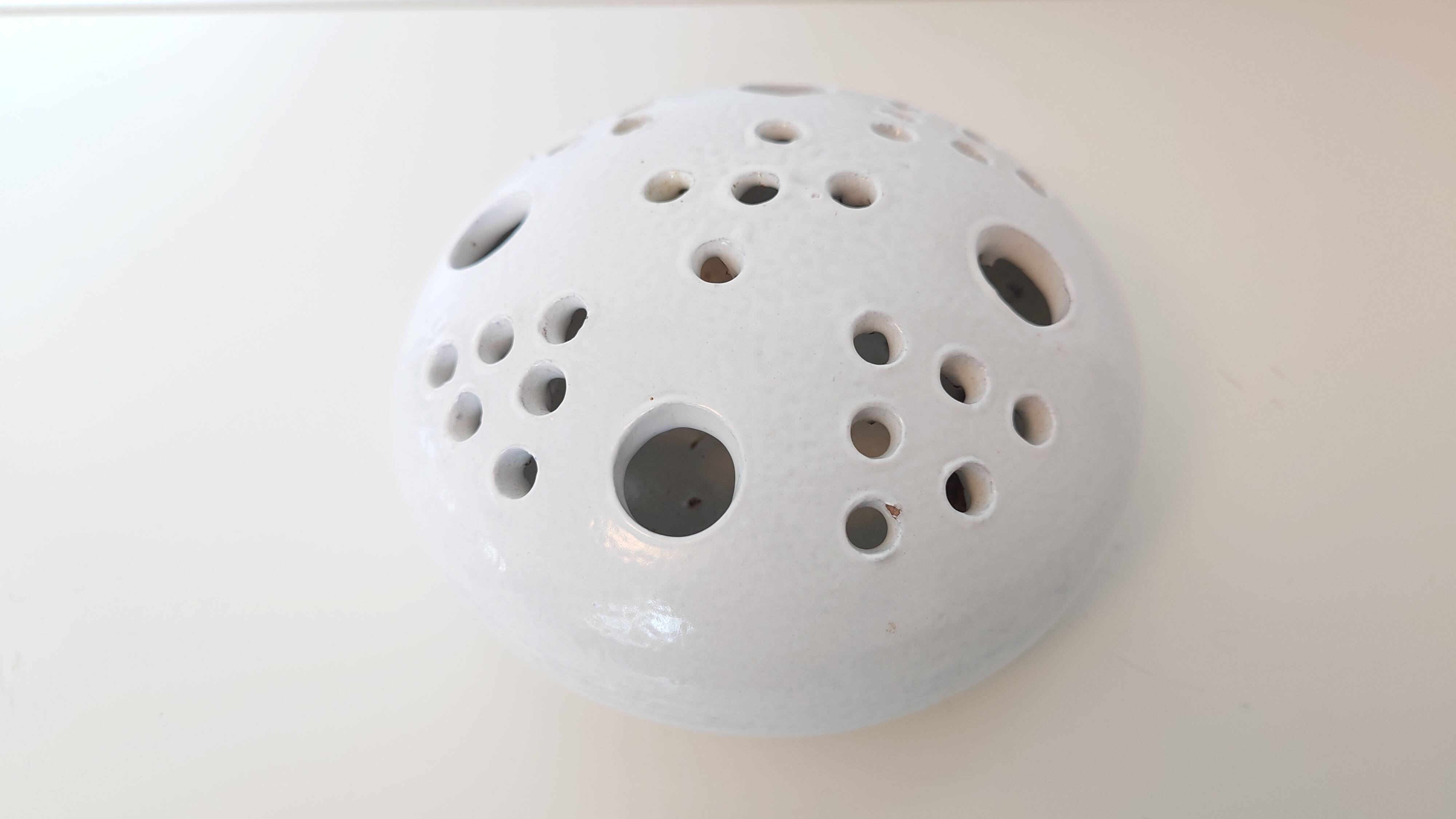 Centrepiece, white ceramic flower holder signed.