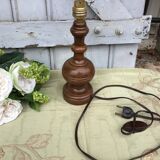 Turned wooden foot lamp with pleated lampshade