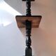 Column in blackened oak with two shelves.