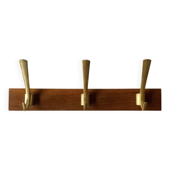 Vintage wooden wall-mounted coat rack with 3 golden cast aluminum hooks