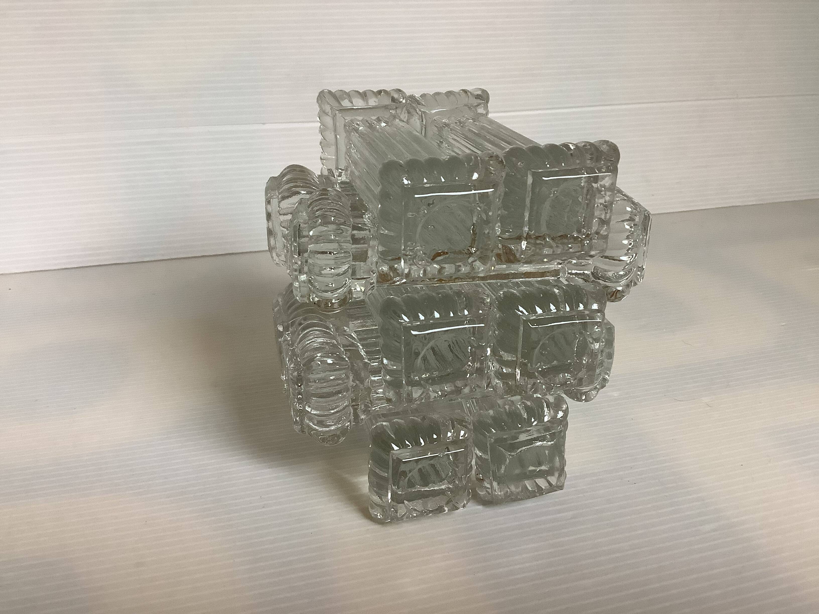 Ten old molded glass knife holders