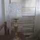 Vintage table lamp with a bronze base and moulded glass globe.