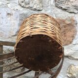 Bottle in clear glass with wicker