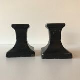 Pair of black candlesticks