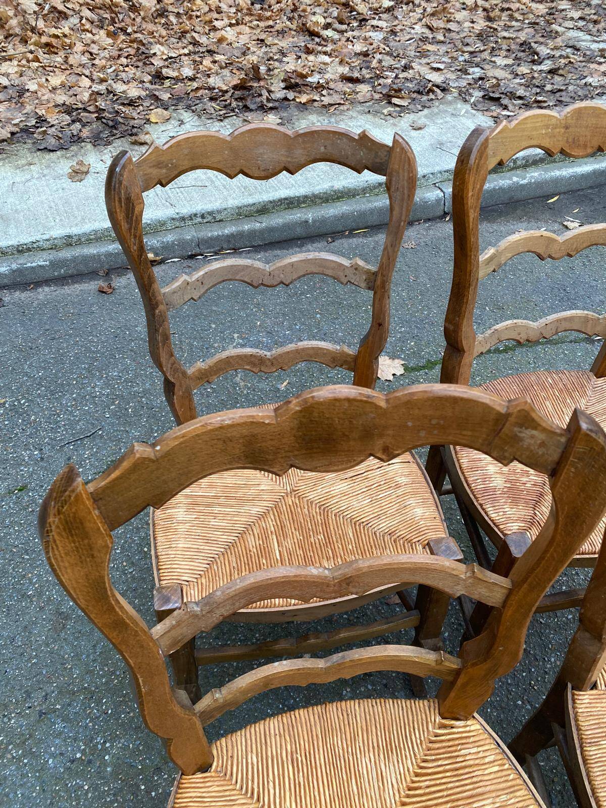 Four Louis XV chairs in solid oak and straw seats, 19th century