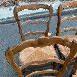 Four Louis XV chairs in solid oak and straw seats, 19th century