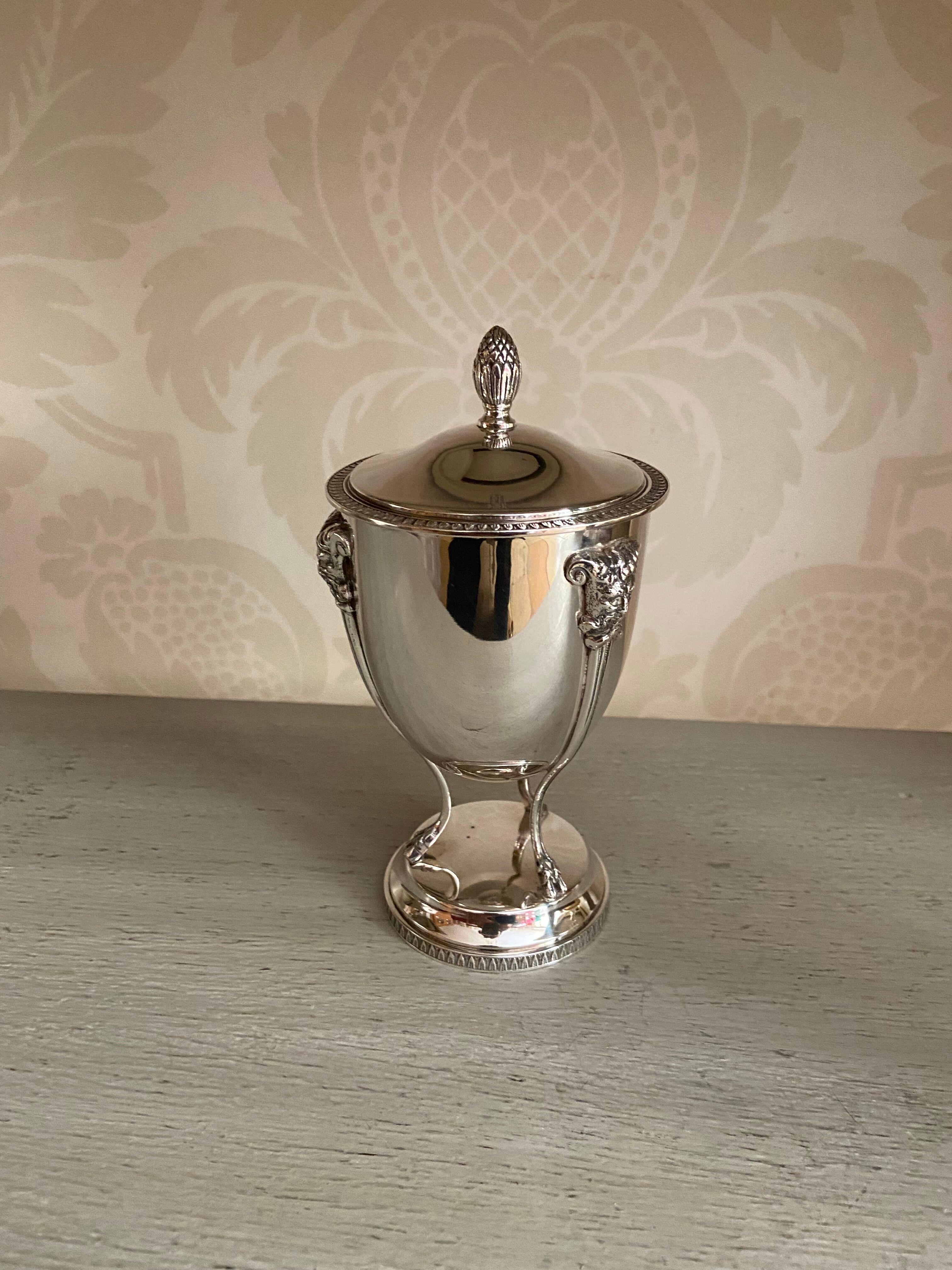 Silver metal sugar bowl on claws