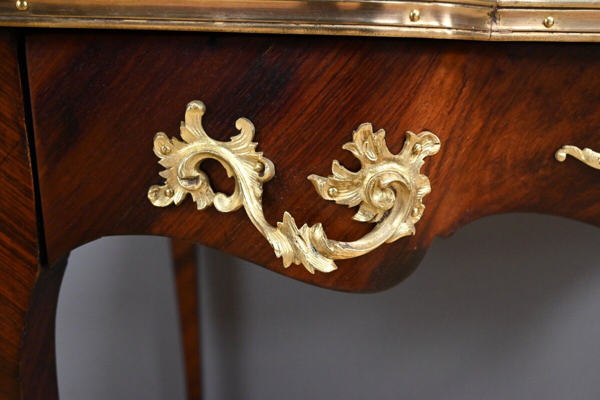 Rosewood, mahogany, and rosewood desk-table, Louis XV style – early 20th century.