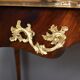 Rosewood, mahogany, and rosewood desk-table, Louis XV style – early 20th century.
