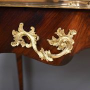 Rosewood, mahogany, and rosewood desk-table, Louis XV style – early 20th century.
