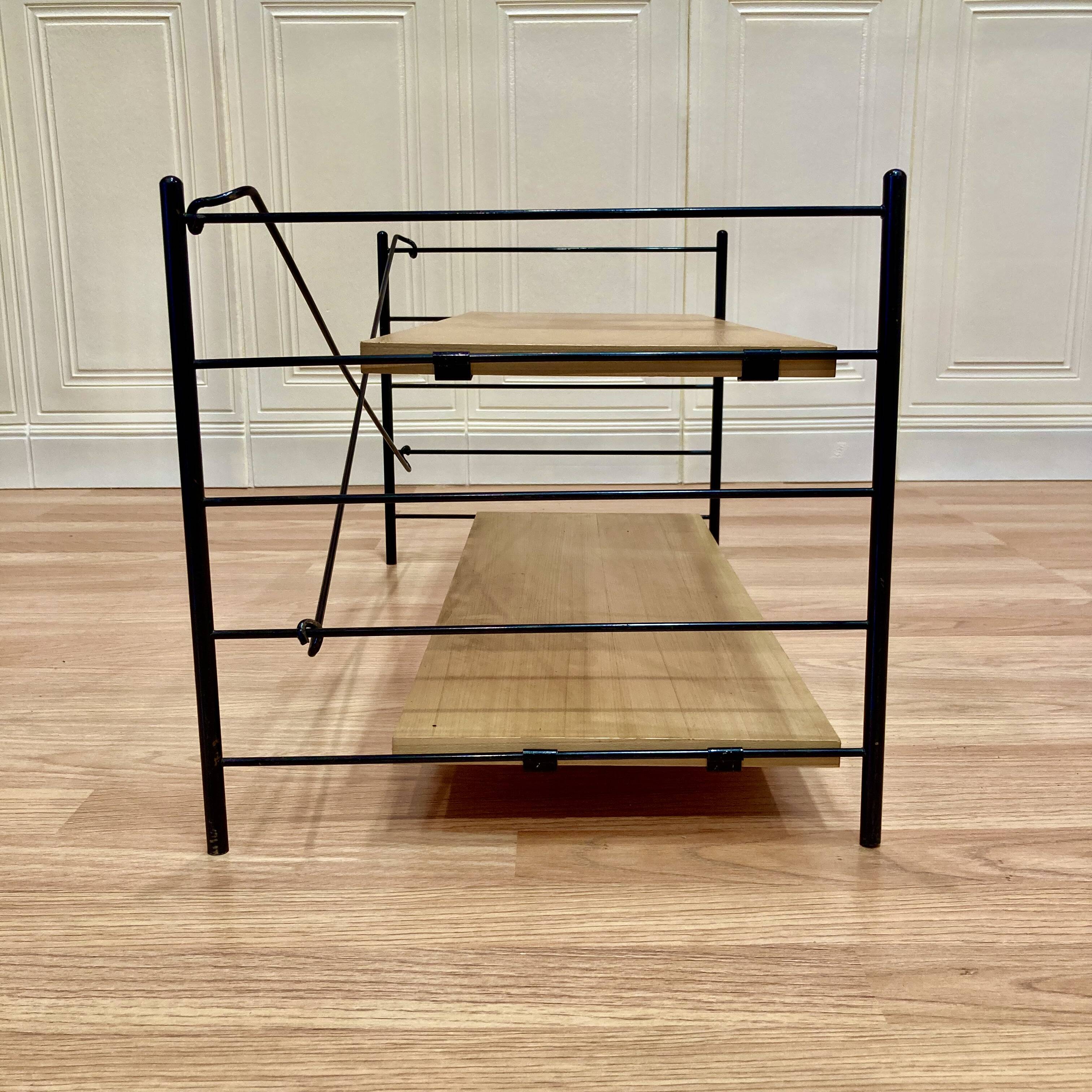 Modular metal and wood shelf design from the 1960s.