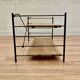 Modular metal and wood shelf design from the 1960s.