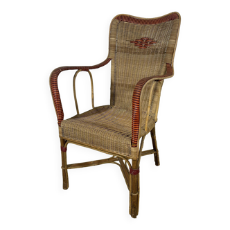 Rattan armchair and scoubidou decor