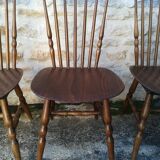 Eight mismatched bistro chairs