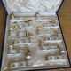 12 Limoges art porcelain knife rests in their case