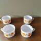 Suite of 4 large vintage cups
