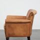 Beautiful subtle vintage sheepskin armchair with elegant legs