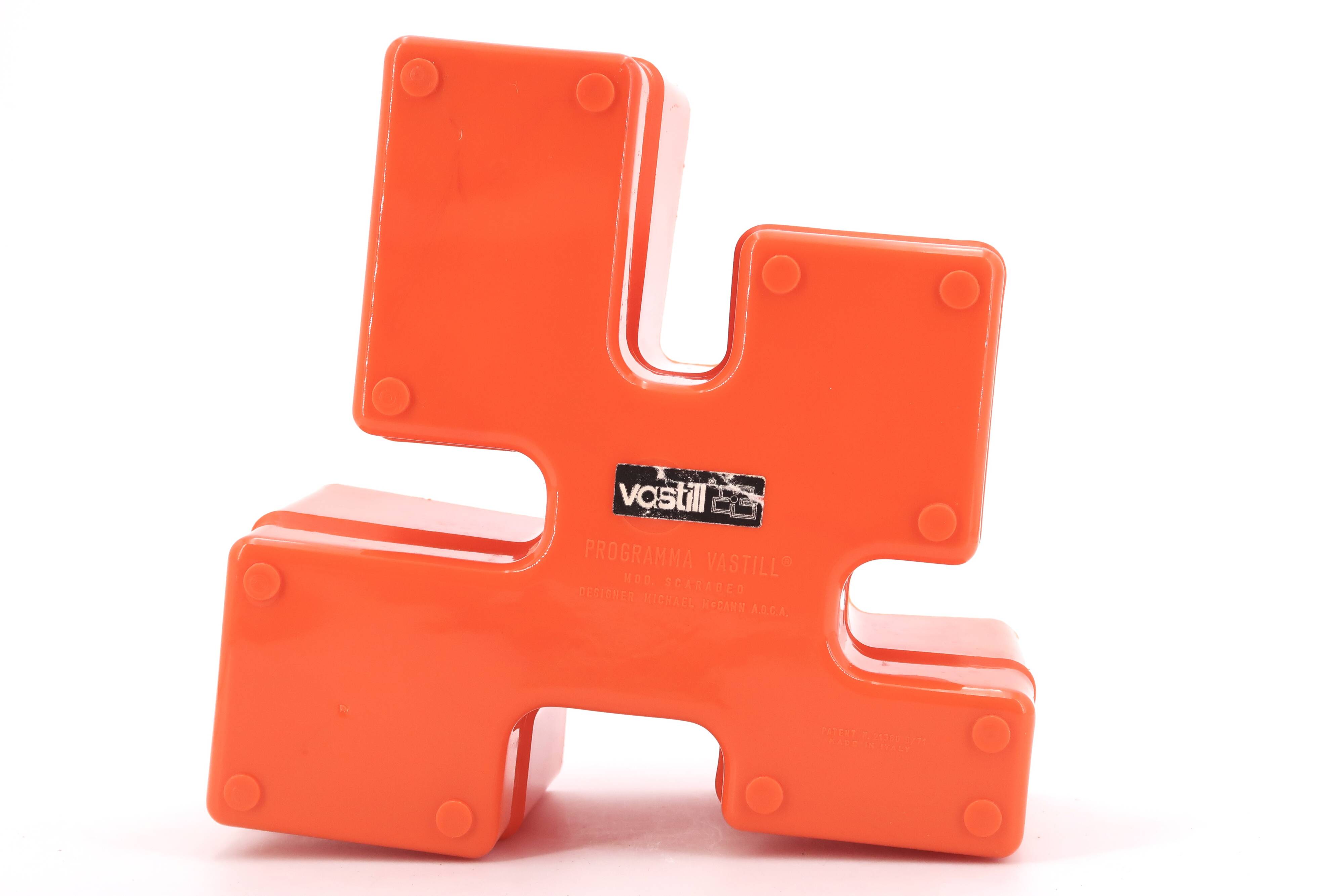Vastill orange plastic planter by Michael McCann