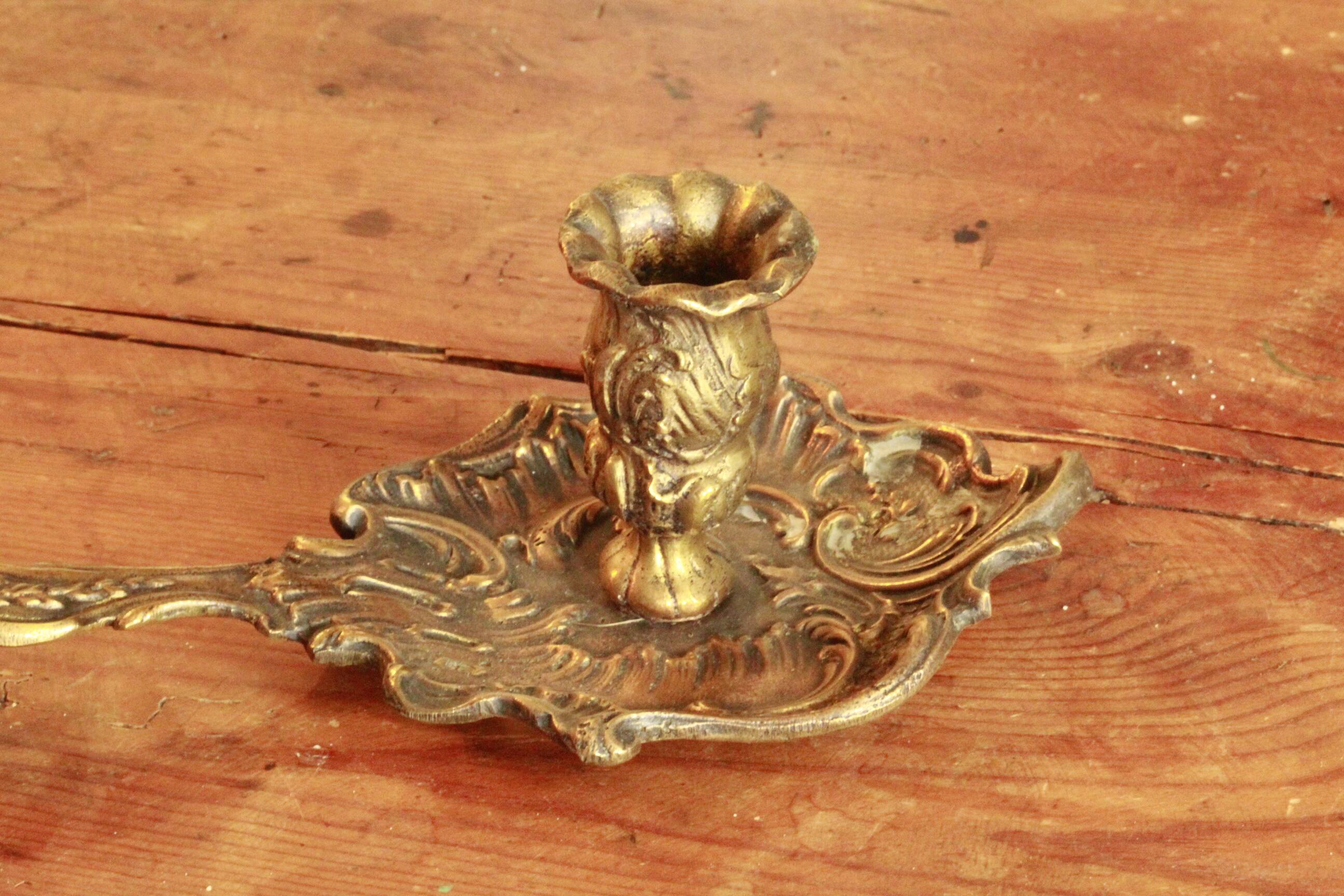 Old hand candle holder