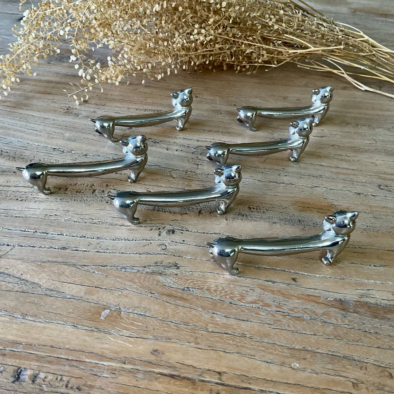 6 silver metal “cat” knife holders