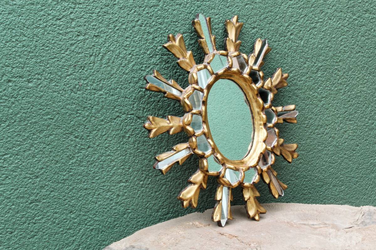 Sun mirror with parecloses, carved wood