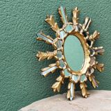 Sun mirror with parecloses, carved wood