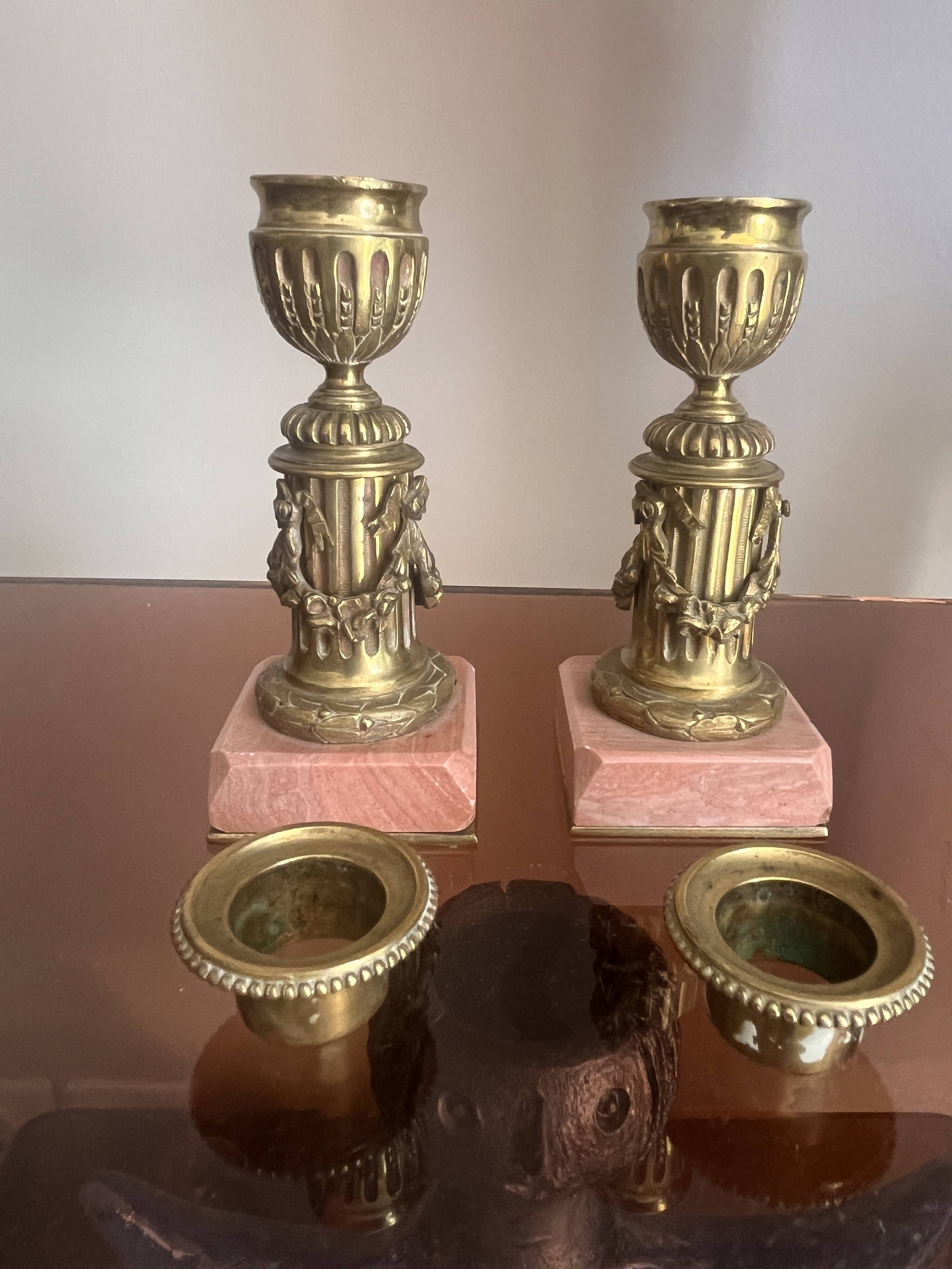 pair of antique bronze candlesticks