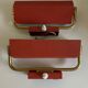 Pair of modernist swivel wall lights in red sheet metal, 1950s