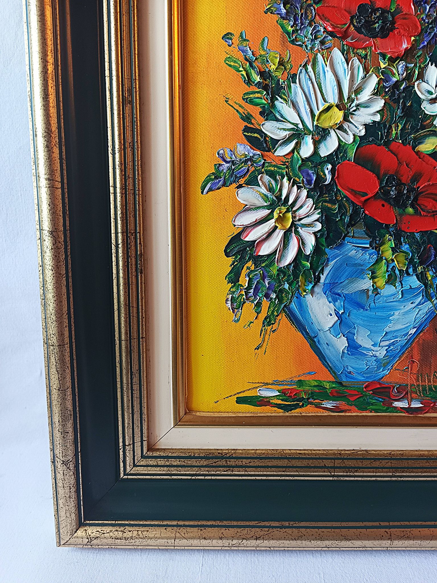 Oil painting on canvas, bouquet of flowers in a framed vase, signed.