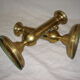 Pair of brass push-up candlesticks, 1940