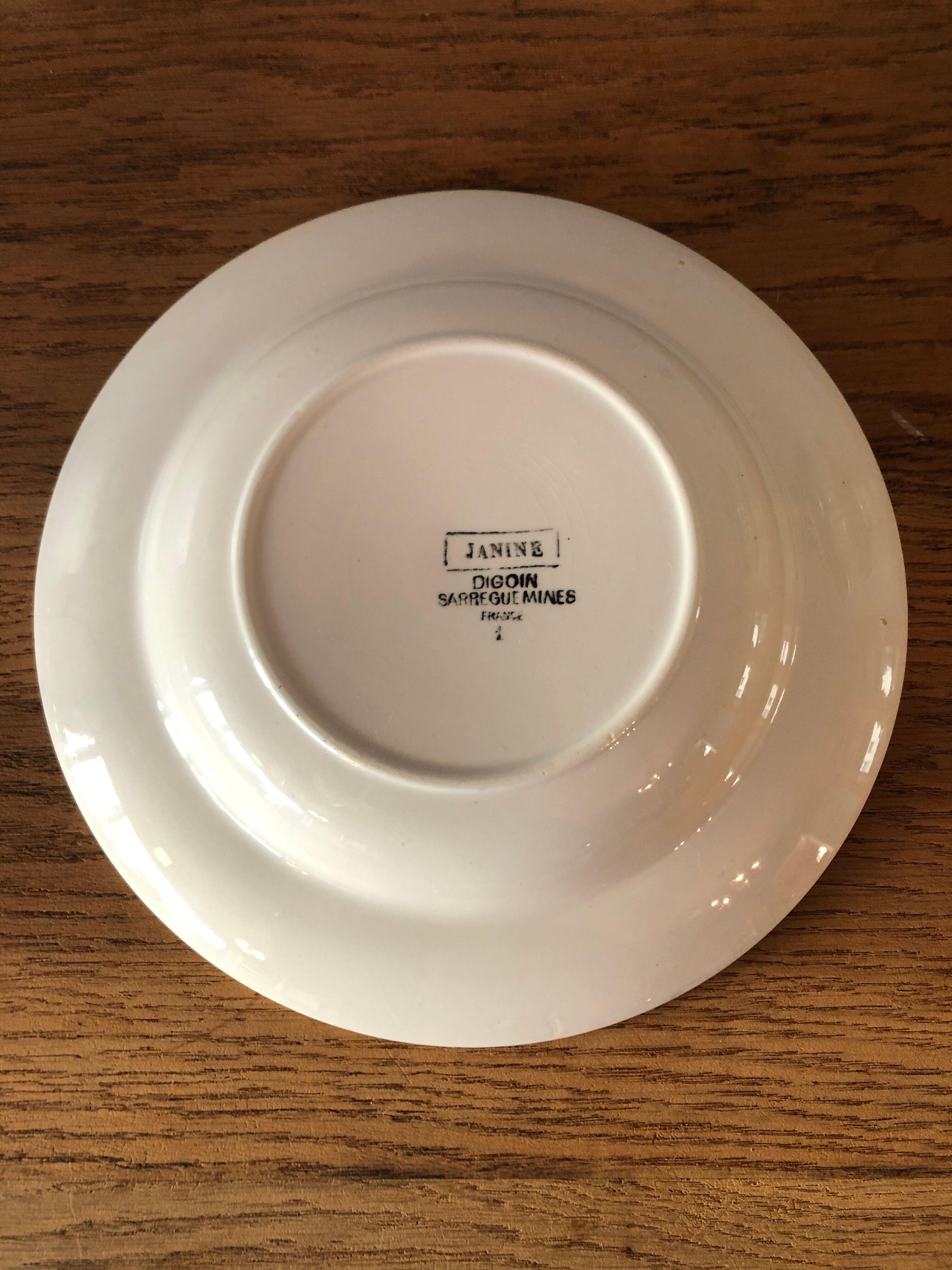 Set of 8 hollow plates in earthenware