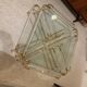 Coffee table and its 4 associated nesting tables in plexiglass and gold metal
