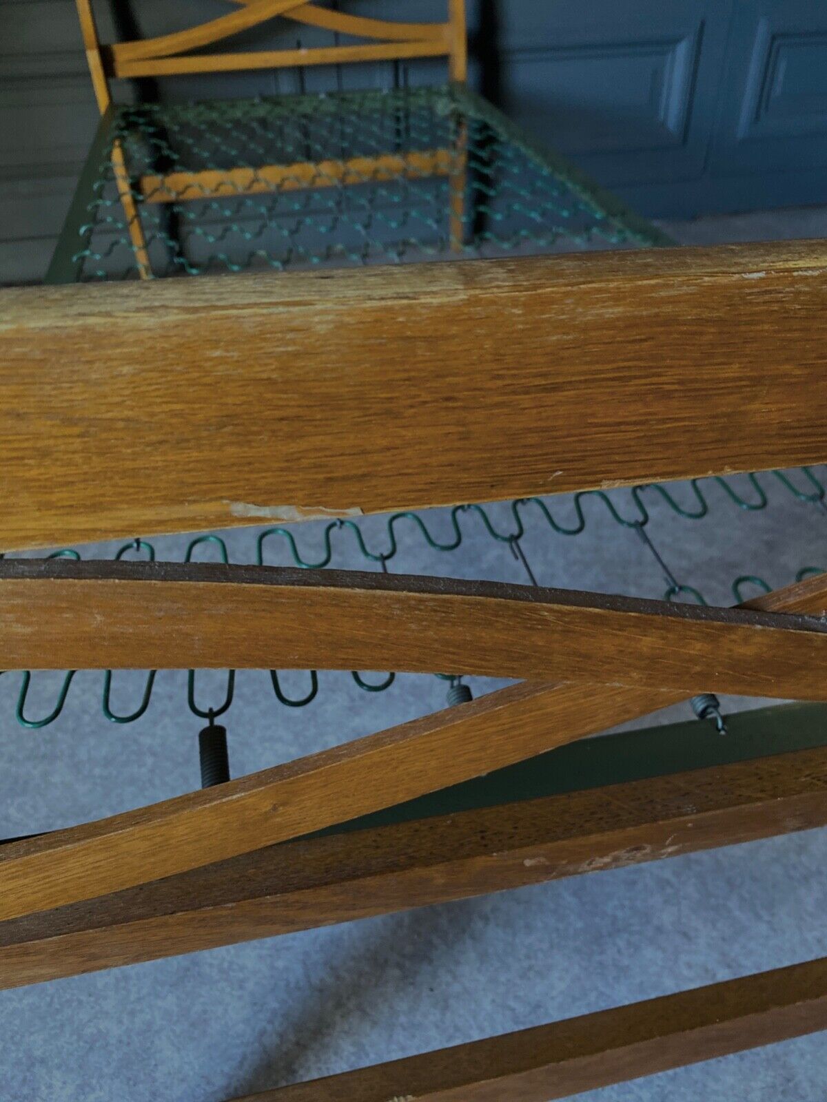 Bed with green metal braces 1960 a person foldable