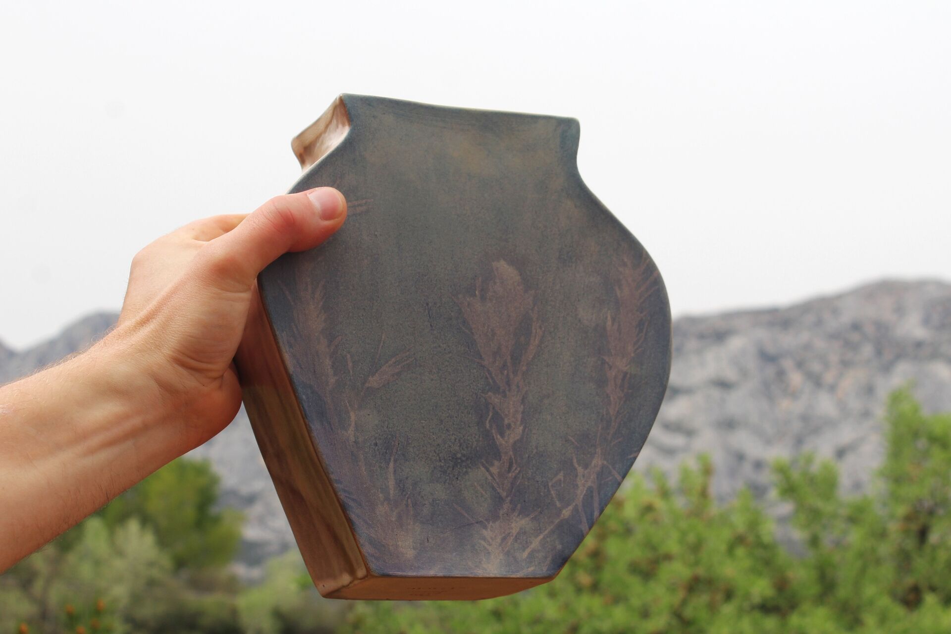 Decorative ceramic vase and cyanotype