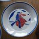 set of 4 Art Deco plates signed Louis Garin HB Quimper