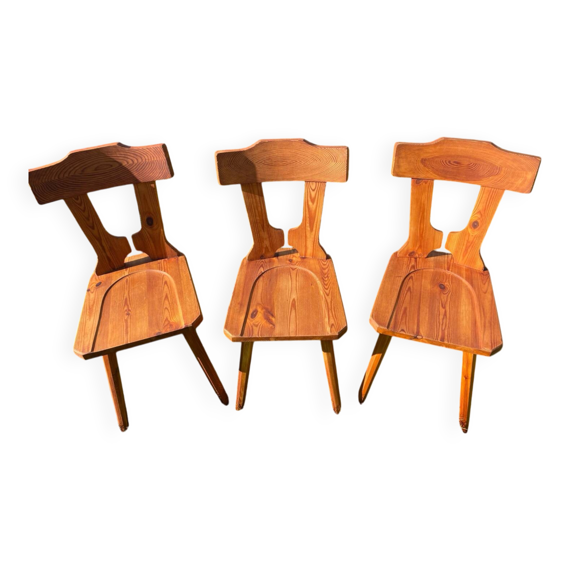 Three solid wood chairs