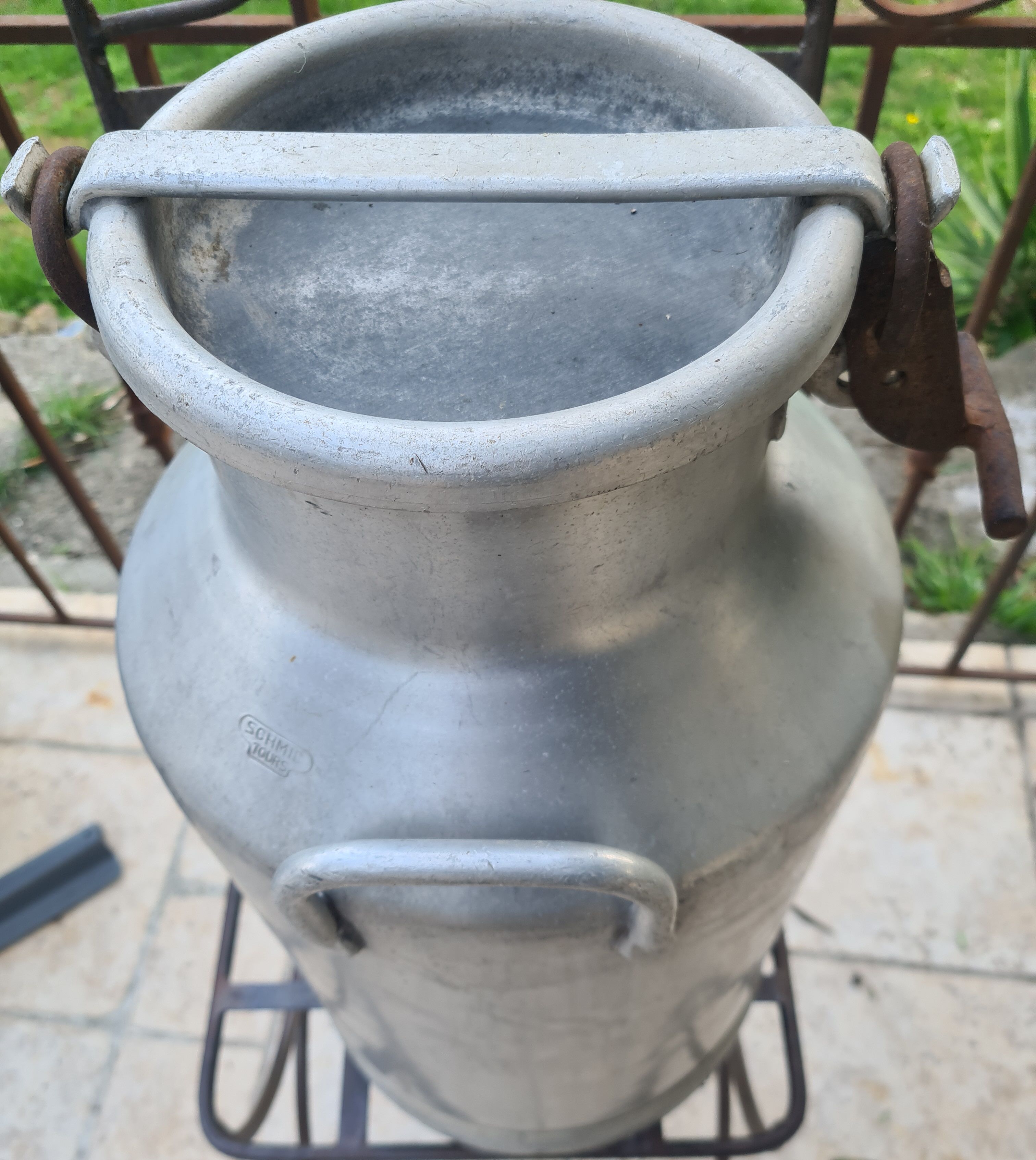 set of 2 old aluminum milk jugs