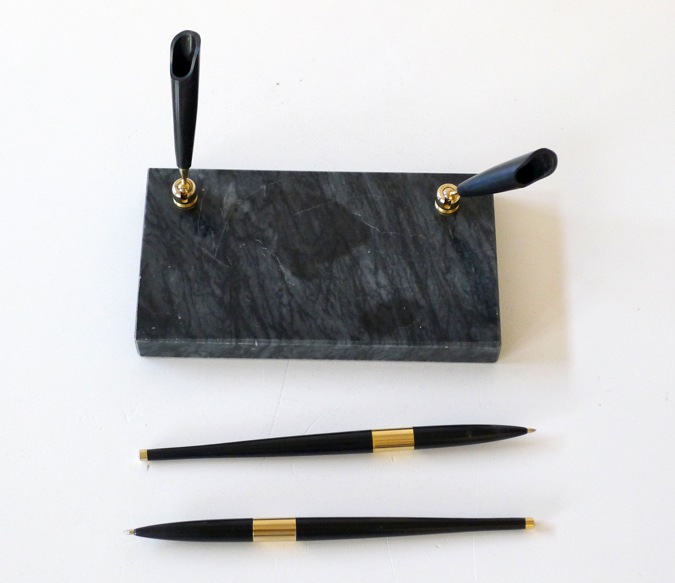 Pen doors on marble base