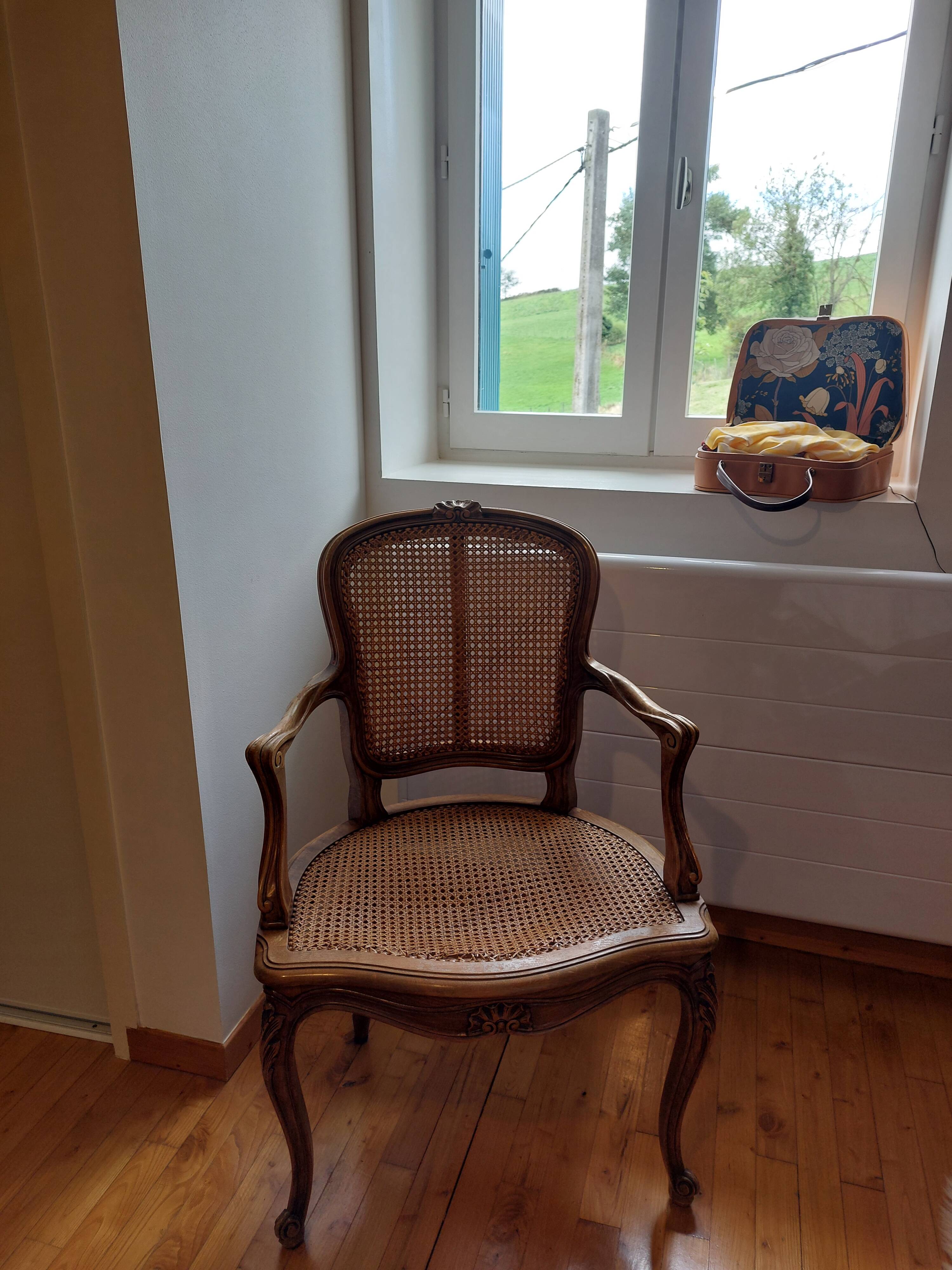 Louis XV style caned armchair