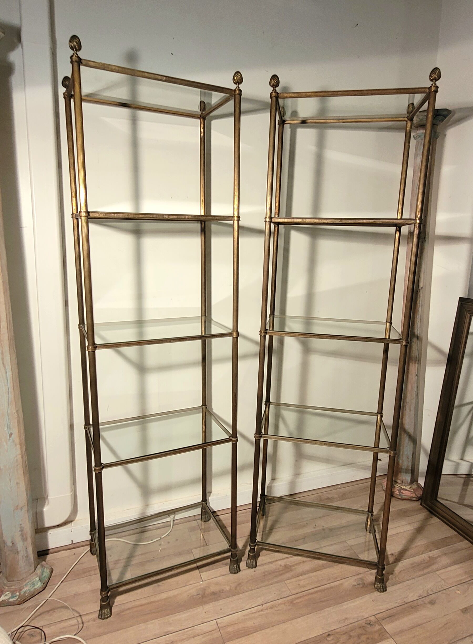 Pair of brass and gilded bronze shelves feet lion's feet