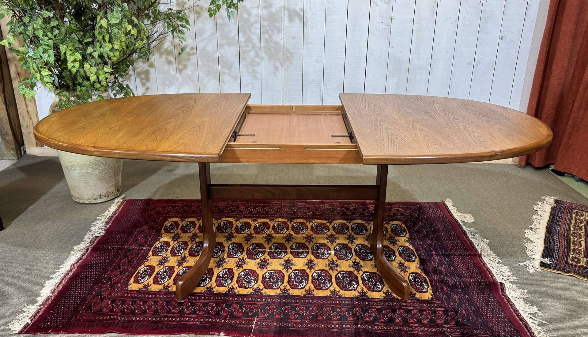 G-Plan oval teak table from the 1970s with a butterfly extension.