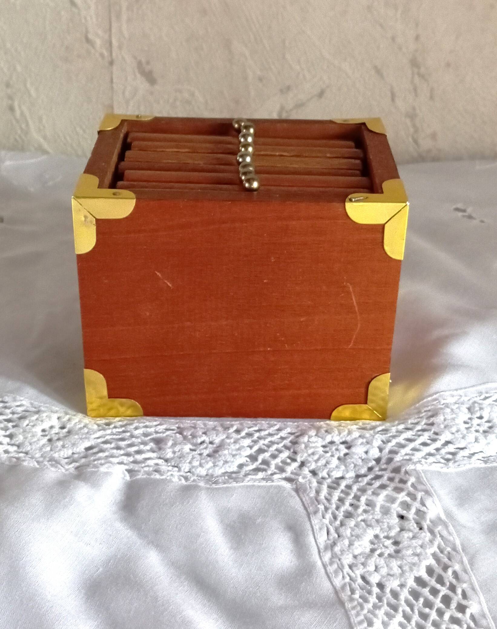 Vintage wooden and cork coaster set with decorative box